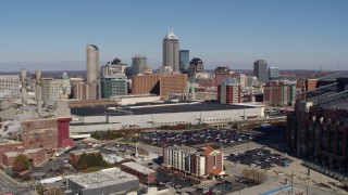 DX0001_002806 - 5.7K aerial stock footage flyby brick factory and convention center, focus on city skyline, Downtown Indianapolis, Indiana