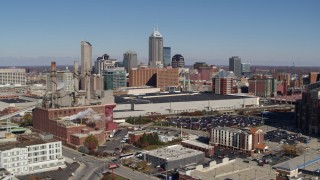 DX0001_002809 - 5.7K stock footage aerial video approach brick factory, convention center and city skyline, Downtown Indianapolis, Indiana