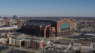 DX0001_002814 - 5.7K aerial stock footage orbit and approach a football stadium in Indianapolis, Indiana
