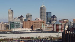 DX0001_002817 - 5.7K stock footage aerial video descend and flyby the city's skyline in Downtown Indianapolis, Indiana