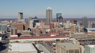 DX0001_002822 - 5.7K aerial stock footage of the tall skyscrapers of the city's skyline in Downtown Indianapolis, Indiana