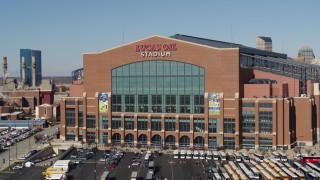 DX0001_002834 - 5.7K aerial stock footage of the front of a football stadium in Indianapolis, Indiana