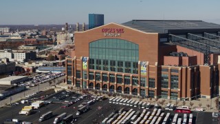 DX0001_002836 - 5.7K aerial stock footage of descending in front of a football stadium in Indianapolis, Indiana