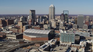 DX0001_002839 - 5.7K aerial stock footage of a reverse view of the city's skyline in Downtown Indianapolis, Indiana