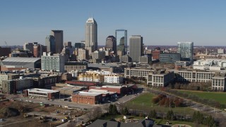 DX0001_002846 - 5.7K aerial stock footage passing by the city's skyline in Downtown Indianapolis, Indiana