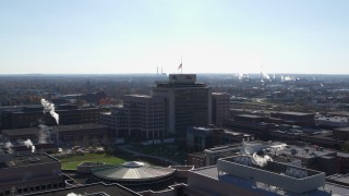 DX0001_002854 - 5.7K aerial stock footage of circling around an office building in Indianapolis, Indiana