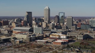 DX0001_002858 - 5.7K stock footage aerial video of passing by tall skyscrapers in the city's skyline in Downtown Indianapolis, Indiana