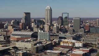 DX0001_002859 - 5.7K aerial stock footage of slowly approaching tall skyscrapers in the city's skyline in Downtown Indianapolis, Indiana