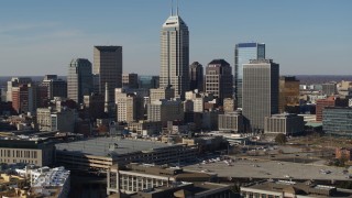 DX0001_002863 - 5.7K aerial stock footage of slow reverse view of towering skyscrapers in the city's skyline in Downtown Indianapolis, Indiana
