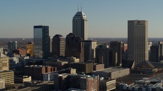 DX0001_002879 - 5.7K aerial stock footage of approaching by the skyline of Downtown Indianapolis, Indiana