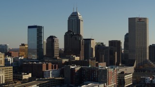 DX0001_002881 - 5.7K stock footage aerial video of flying away from Salesforce Tower and the skyline of Downtown Indianapolis, Indiana