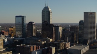 DX0001_002884 - 5.7K stock footage aerial video flyby skyscrapers in the skyline of Downtown Indianapolis, Indiana before ascent and approach