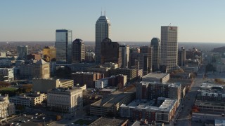 DX0001_002894 - 5.7K stock footage aerial video flyby and approach the skyline in Downtown Indianapolis, Indiana