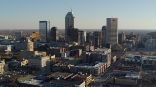 DX0001_002896 - 5.7K aerial stock footage flyby the skyline in Downtown Indianapolis, Indiana and ascend