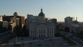 DX0001_002906 - 5.7K aerial stock footage flying by the Indiana State House in Downtown Indianapolis, Indiana