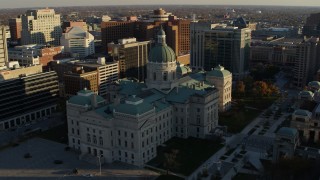 DX0001_002907 - 5.7K aerial stock footage ascend and orbit the Indiana State House in Downtown Indianapolis, Indiana