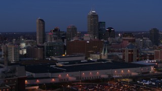 DX0001_002966 - 5.7K aerial stock footage flyby and away from city skyline at twilight, Downtown Indianapolis, Indiana