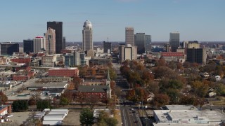 DX0001_002980 - 5.7K aerial stock footage of slowly flying by the city's skyline, Downtown Louisville, Kentucky