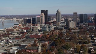 DX0001_002986 - 5.7K aerial stock footage ascend and flyby the city's skyline in Downtown Louisville, Kentucky
