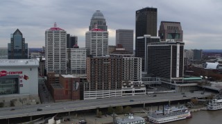 DX0001_003037 - 5.7K aerial stock footage reverse view of hotel and skyline, revealing the river in Downtown Louisville, Kentucky