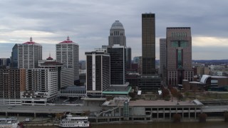 DX0001_003040 - 5.7K aerial stock footage approach hotel and the skyline from the river in Downtown Louisville, Kentucky