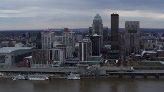 DX0001_003053 - 5.7K stock footage aerial video slowly fly away from riverfront buildings and skyline in Downtown Louisville, Kentucky