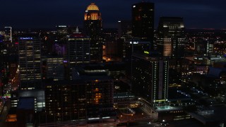 DX0001_003123 - 5.7K aerial stock footage passing by the city's skyline at twilight, Downtown Louisville, Kentucky