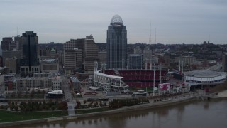 DX0001_003125 - 5.7K aerial stock footage a view of the baseball stadium and skyscraper from the river, Downtown Cincinnati, Ohio