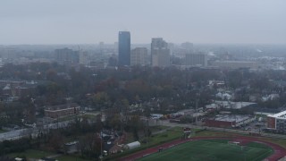 DX0001_003208 - 5.7K aerial stock footage slowly flying by the city skyline seen from residential neighborhoods, Downtown Lexington, Kentucky