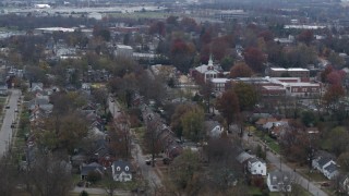 DX0001_003235 - 5.7K aerial stock footage church steeple and suburban neighborhood in Lexington, Kentucky