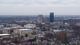 DX0001_003243 - 5.7K aerial stock footage of flying by skyscrapers in the city skyline of Downtown Lexington, Kentucky