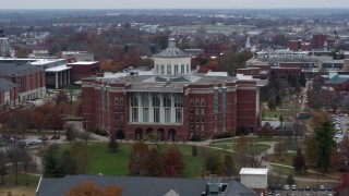 DX0001_003247 - 5.7K aerial stock footage a reverse view of a University of Kentucky library, Lexington, Kentucky