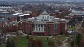 DX0001_003250 - 5.7K aerial stock footage slowly passing a University of Kentucky library, Lexington, Kentucky