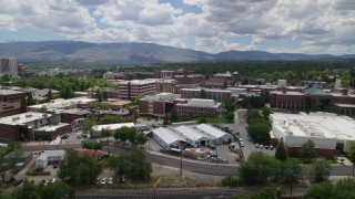 DX0001_004_016 - 5.7K aerial stock footage flyby buildings on the campus of the University of Nevada in Reno, Nevada