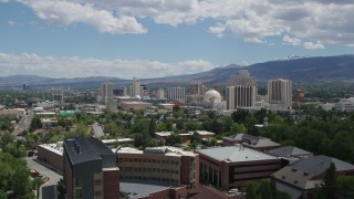 DX0001_004_025 - 5.7K aerial stock footage of hotels and casinos making up the skyline of Reno, Nevada