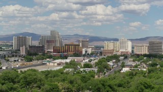 DX0001_004_055 - 5.7K aerial stock footage of a view of the large hotels and casino resorts of Reno, Nevada seen while ascending