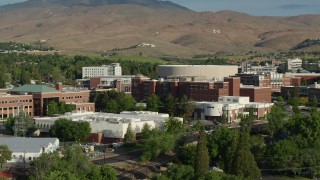 DX0001_006_007 - 5.7K aerial stock footage of flying by buildings on the campus of the University of Nevada in Reno, Nevada