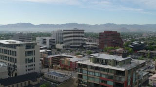 DX0001_006_037 - 5.7K aerial stock footage of passing by the city's office buildings in Reno, Nevada