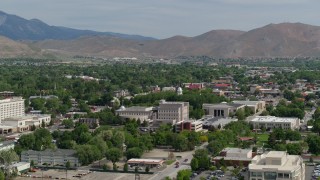 DX0001_007_003 - 5.7K stock footage aerial video flyby the Nevada State Capitol dome and other government buildings in Carson City, Nevada