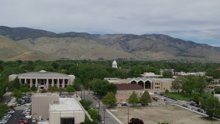 DX0001_007_016 - 5.7K stock footage aerial video approach the Supreme Court, the Nevada State Capitol, and State Library in Carson City, Nevada