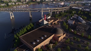 DX0001_010_044 - 5.7K aerial stock footage of the Marquam Bridge, and OMSI in the foreground, Southeast Portland, Oregon