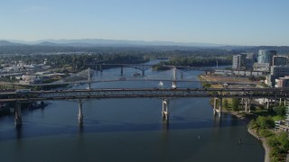 DX0001_011_004 - 5.7K aerial stock footage of the Marquam Bridge (I-5) spanning the Willamette River, South Portland, Oregon