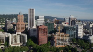 DX0001_011_013 - 5.7K stock footage aerial video approaching downtown buildings and skyscrapers, Downtown Portland, Oregon