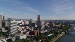DX0001_011_028 - 5.7K aerial stock footage of office buildings along Willamette River, Downtown Portland, Oregon
