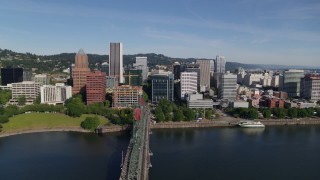DX0001_011_031 - 5.7K aerial stock footage of downtown and the Hawthorne Bridge spanning Willamette River, Downtown Portland, Oregon
