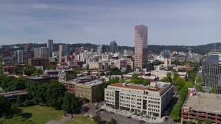 DX0001_012_002 - 5.7K aerial stock footage side view of office buildings and White Stag sign, Downtown Portland, Oregon