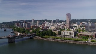 DX0001_012_003 - 5.7K stock footage aerial video of Burnside Bridge, Willamette River and Downtown Portland, Oregon