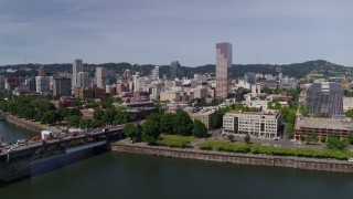 DX0001_012_004 - 5.7K aerial stock footage of Burnside Bridge and the iconic White Stag building and sign, Downtown Portland, Oregon