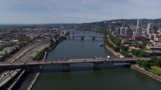 DX0001_012_013 - 5.7K stock footage aerial video approach of downtown bridges spanning Willamette River, Downtown Portland, Oregon