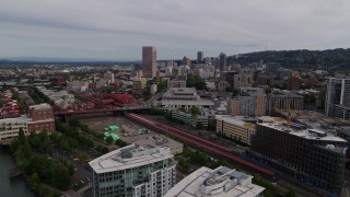 DX0001_013_002 - 5.7K aerial stock footage of Union Station and downtown skyscrapers seen from the Pearl District, Portland, Oregon